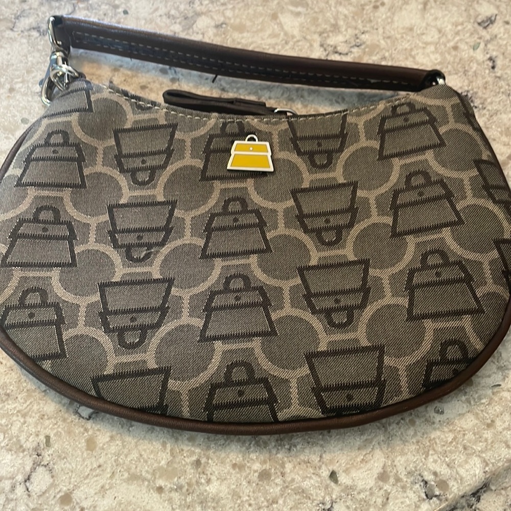 Small bag, small mirror on one side slightly scratched